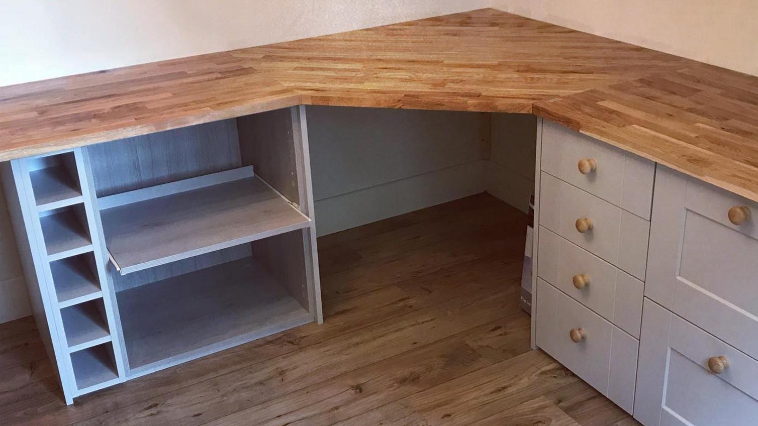 Home office desk using Fairford grey kitchen cabinets and rustic oak solid wood worktop as a desk top.