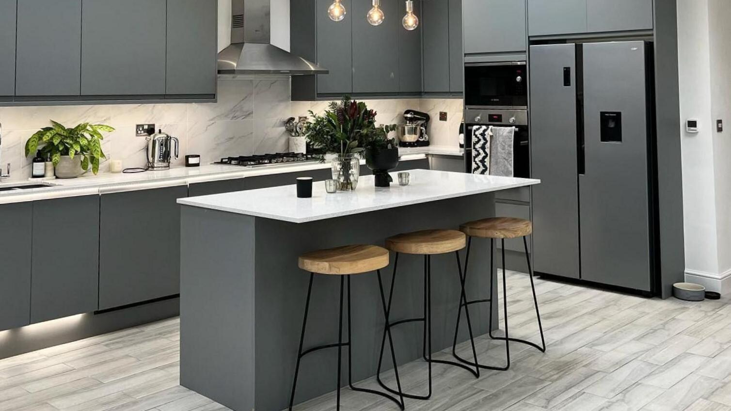 Howdens kitchen island using Clerkenwell matt slate grey, with a silestone quartz worktop.