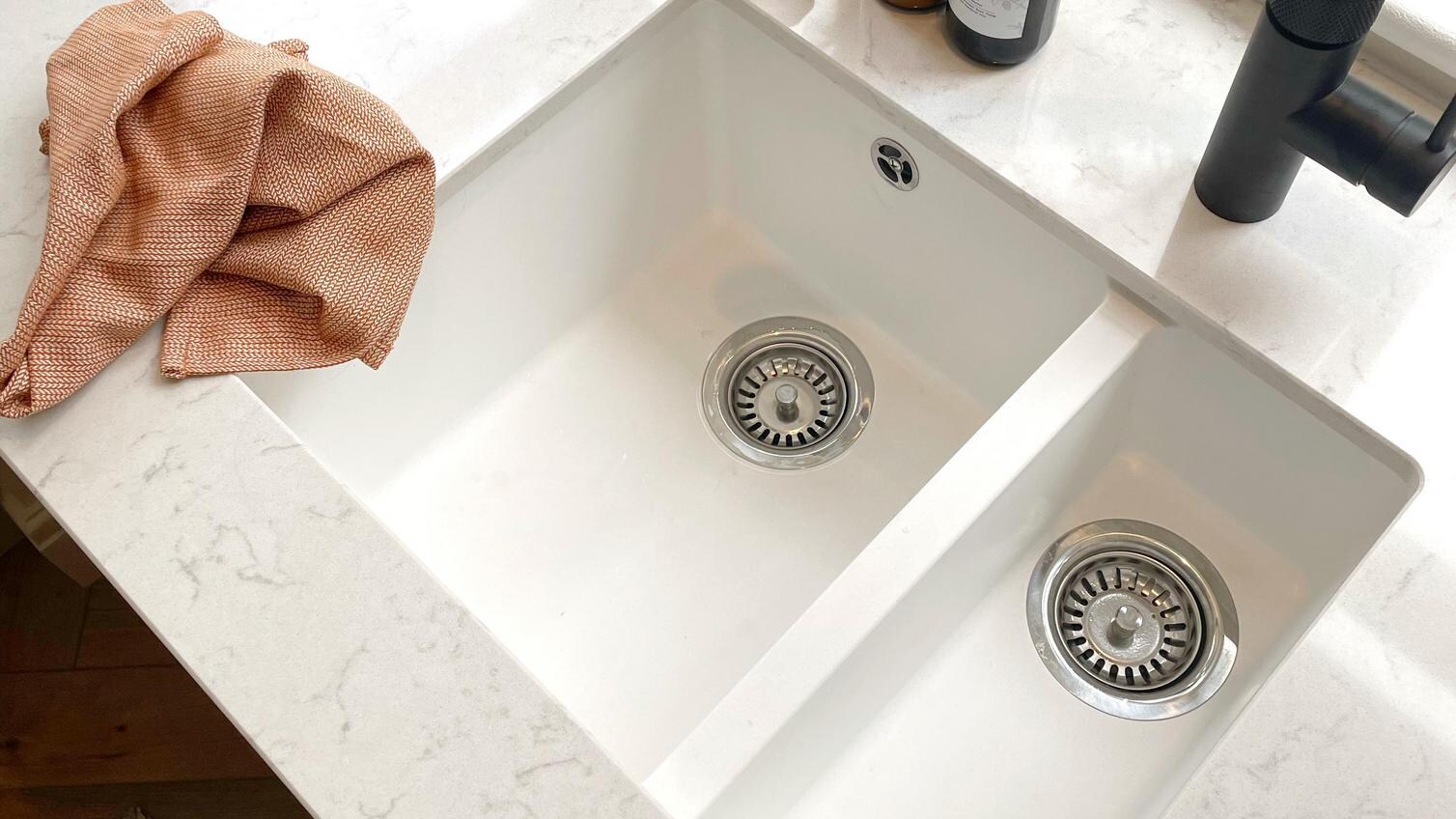 1.5 white undermount sink with black single lever tap