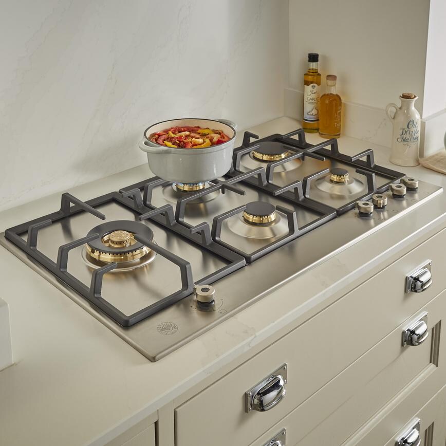 Bertazzoni 90cm 4 Zone Hob With Wok Burner and Pan Angled View in Kitchen Set