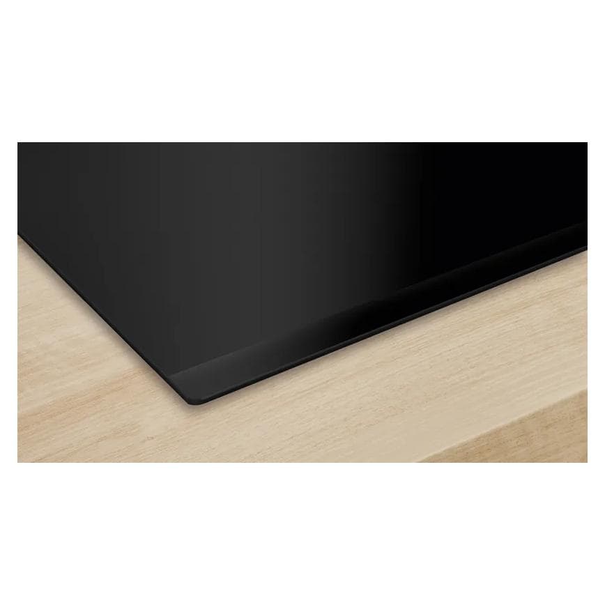 Bosch Serie 4 PUE611BB5B 60cm Black Electric Induction Hob Close Up of The Edge