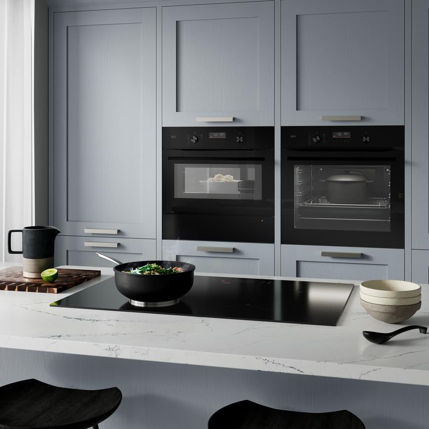 AEG Gloss Black Microwave Oven, Hob, Oven,  Induction Hob and Warming Drawer Closed