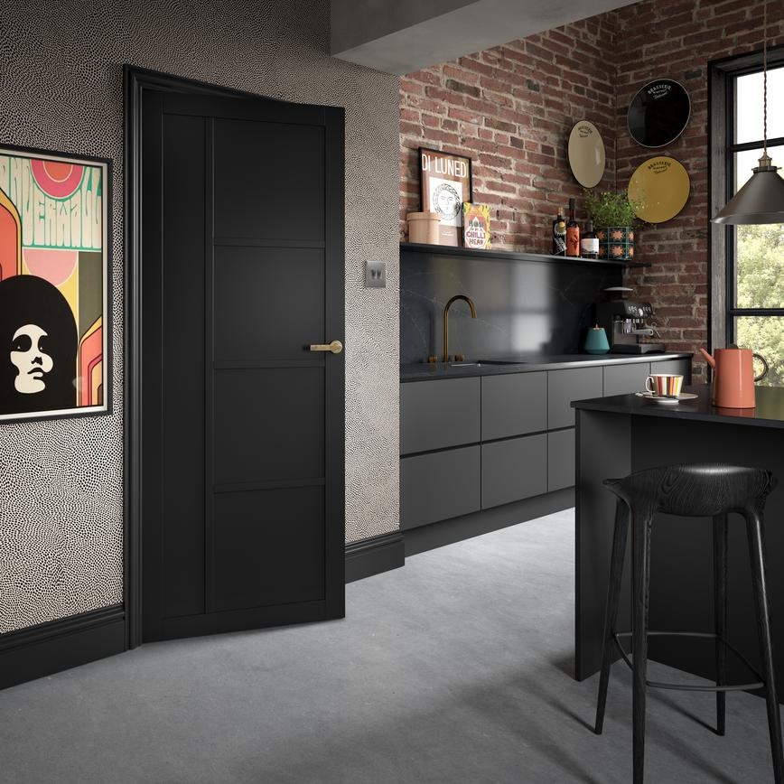 2'6" Harlem Pre-Finished Black Panel Door with Carlisle Brass Handle in a Hockley Charcoal Kitchen Set