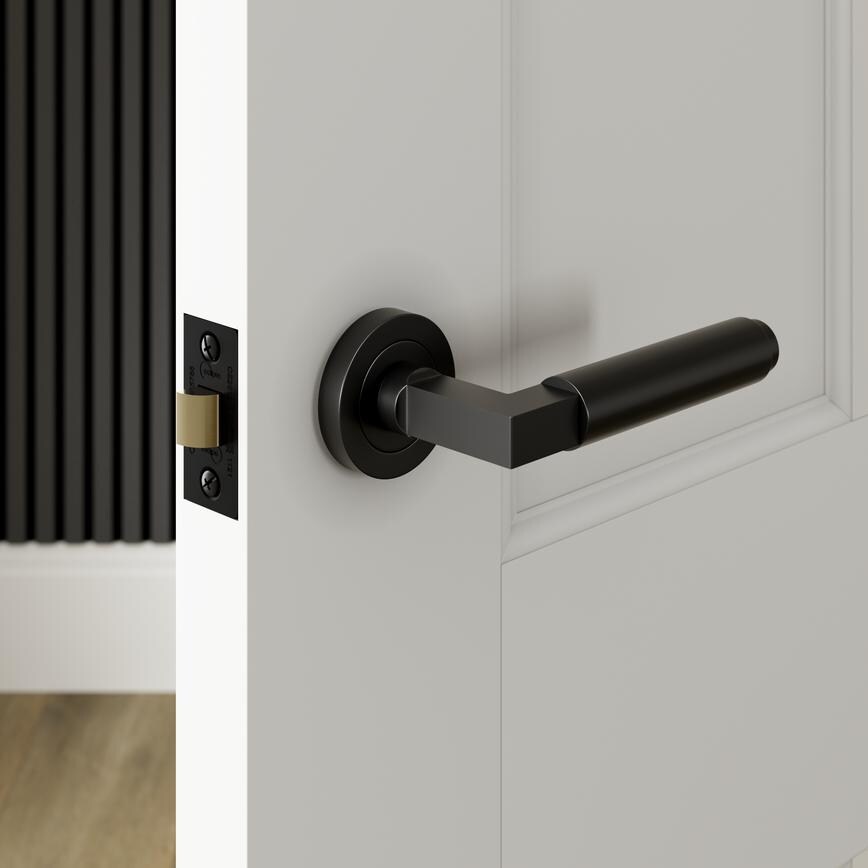 Runda Matt Black Lever on Rose Door Handle Pair