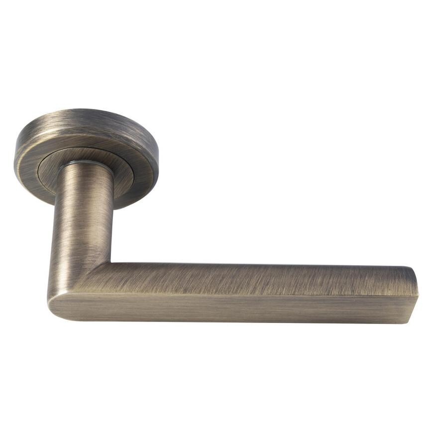 Carlisle Brass Serozzetta Edge Antique Brass Fire Rated Lever on Rose Pair