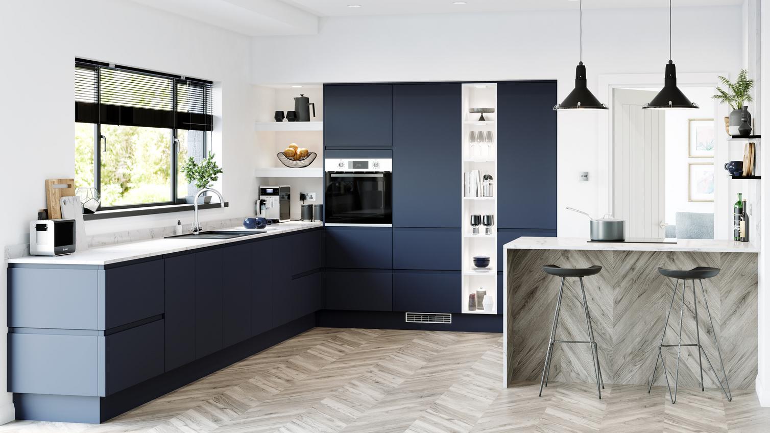 Navy blue handleless super matt kitchen in l shape layout with marble worktop and full height built in open shelving.
