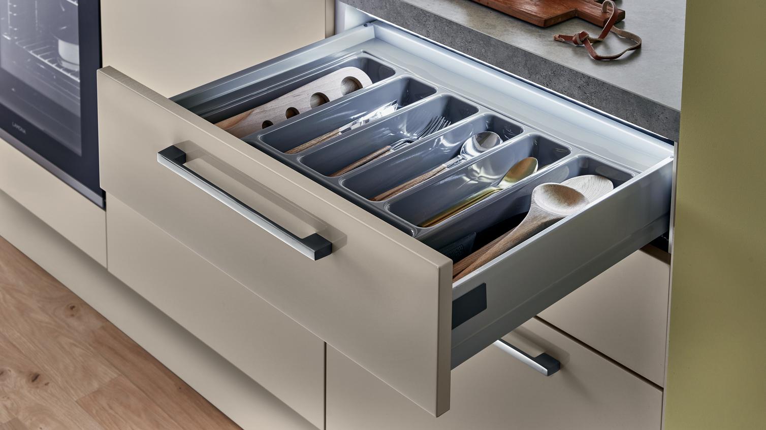 Cutlery tray with retro fit light