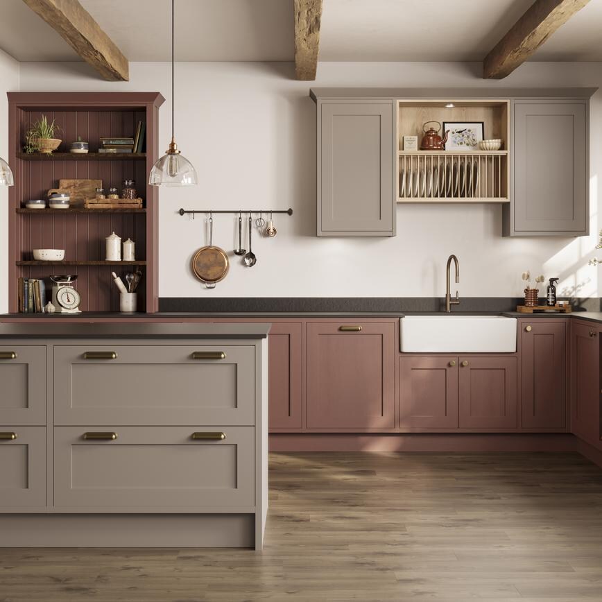A red kitchen idea with shaker cupboards in a peninsula layout. Includes open shelving, a butler sink, and a black extractor.