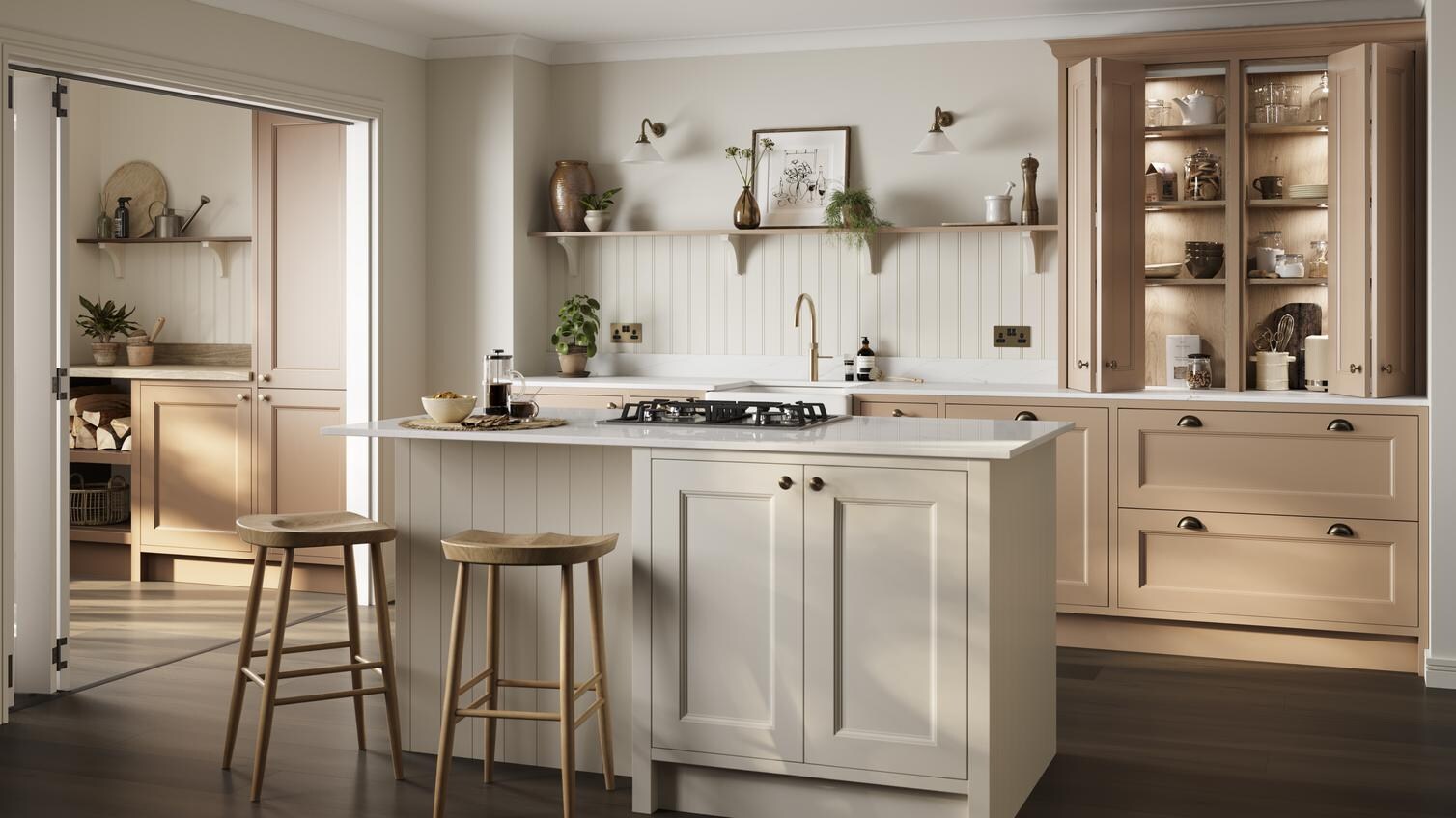 A teracotta kitchen with in-frame, shaker doors and a white island. It is styled with white worktops and oak flooring.