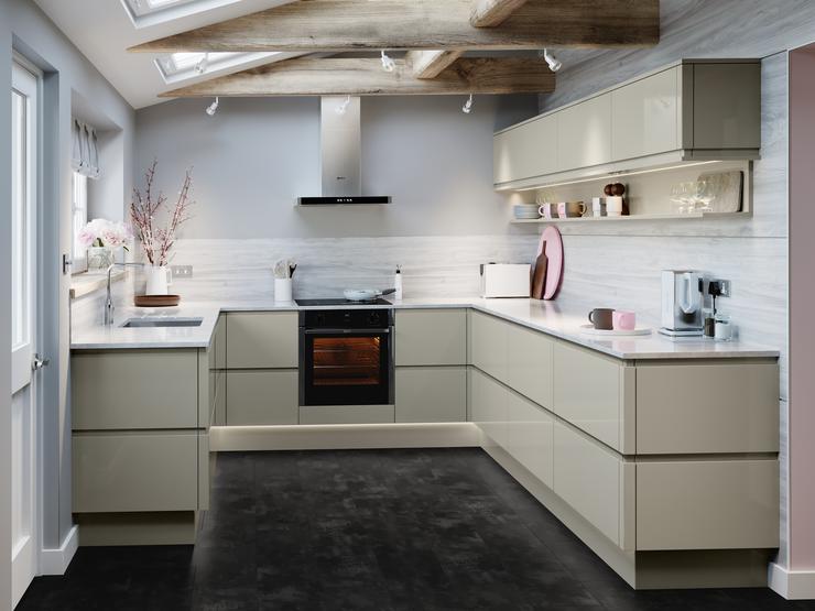 A kitchen extension using an integrated handle kitchen in a pebble colour