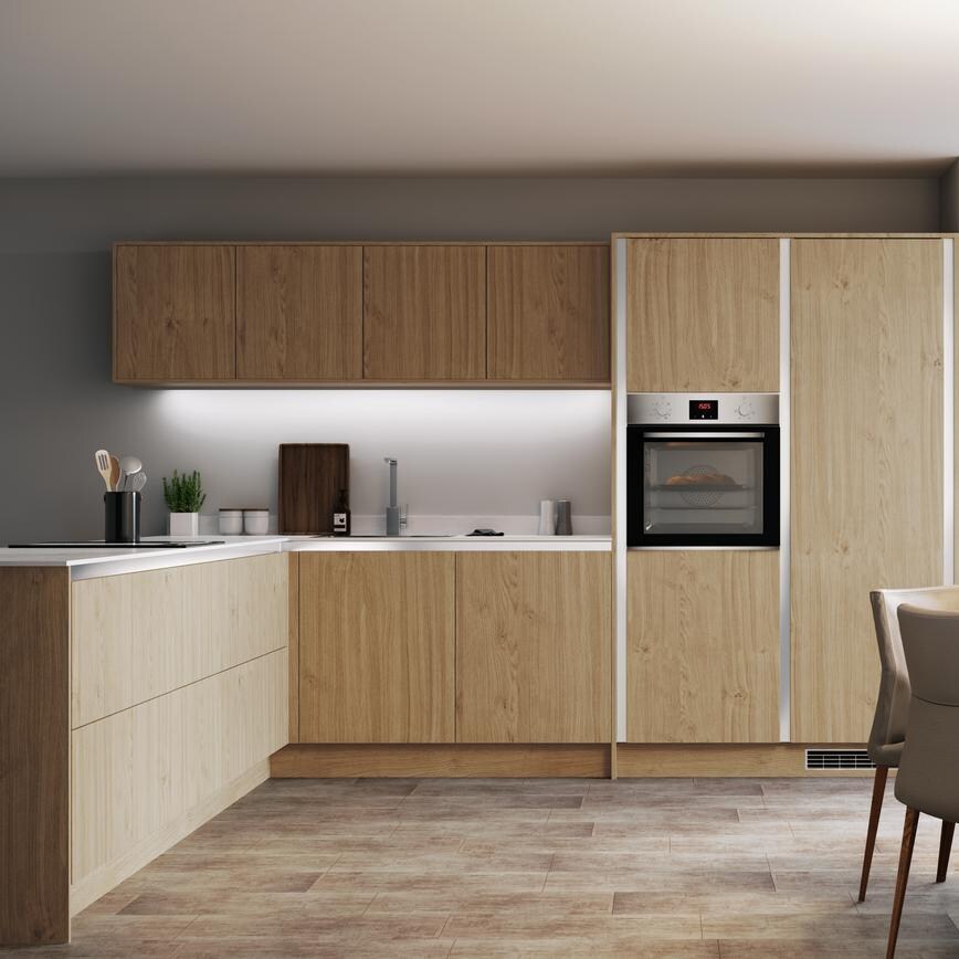 Natural oak handleless kitchen with white worktop, single built in oven and round dining table with garden view,