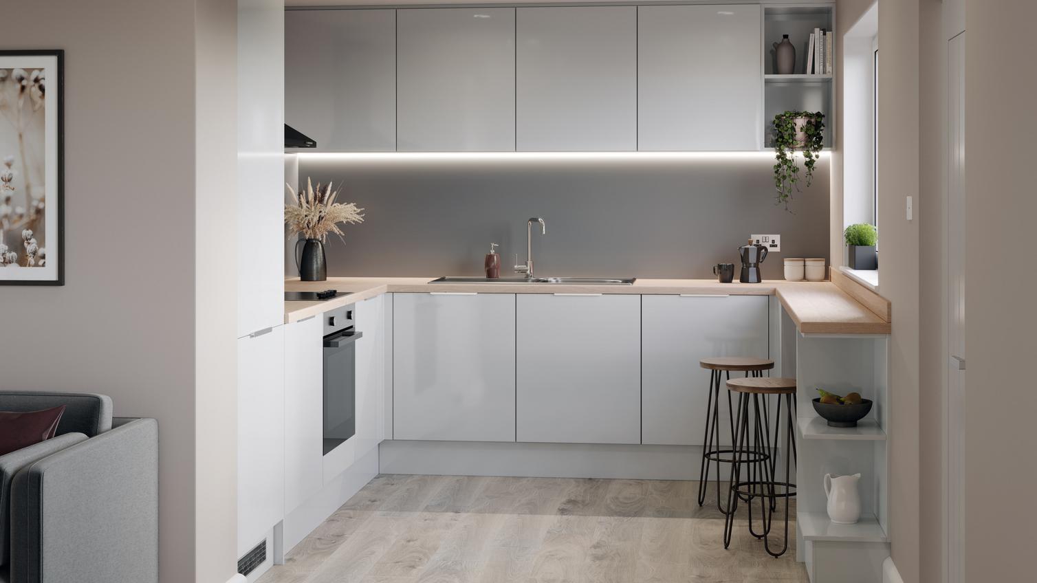 Small u shape kitchen with grey gloss kitchen doors, full height fridge freezer led lighting and beech kitchen worktop.