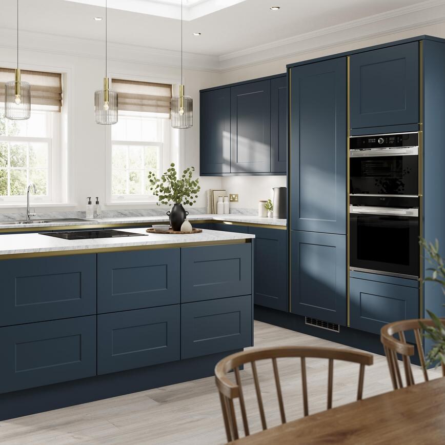 Handleless blue kitchen with marine tones and matt, shaker door fronts. Includes white worktops for a two-tone style
