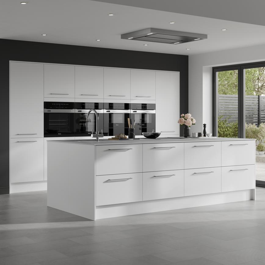 A white slab kitchen with matt finish and island layout. A monochrome design using black worktops, floors, and appliances.