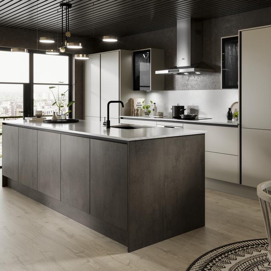 Two-tone handleless kitchen design in an island layout. Includes dark stone and cream slab cupboards and matt-black trims.
