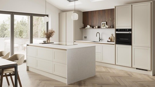 A porcelain, handleless kitchen island in a matt finish & shaker style. It has quartz worktops with side panels & backboard. 