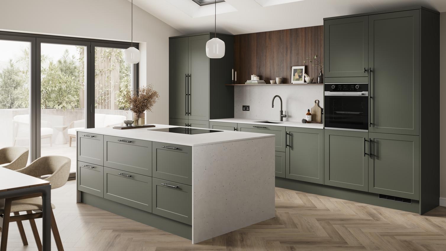 An ash green, shaker kitchen island layout in a matt finish. It has quartz worktops with matching side panels and backboard. 