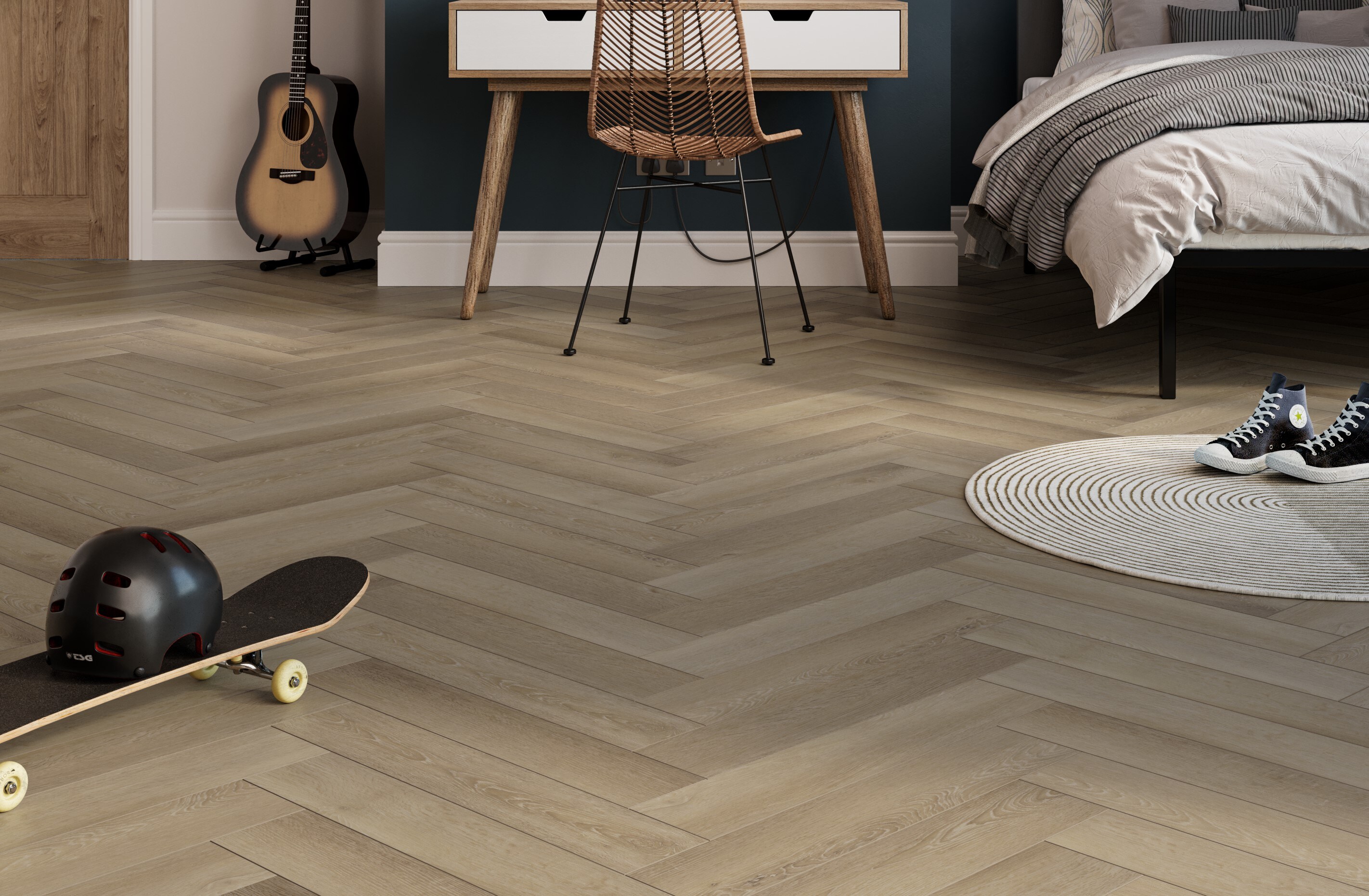 Oak vinyl flooring in a herringbone pattern, fitted within a young adult's bedroom
