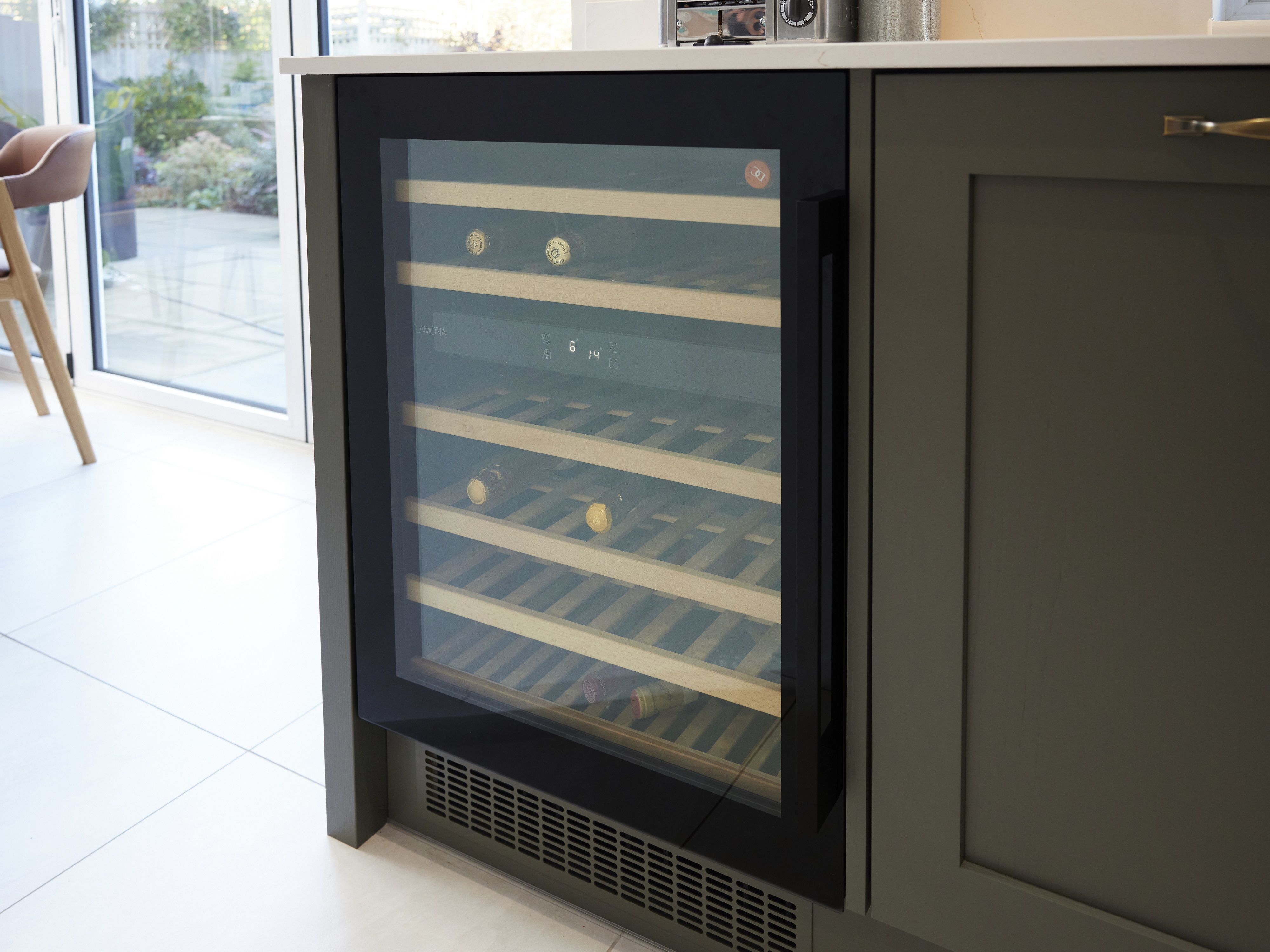 A Lamona wine cooler stocked with  bottles