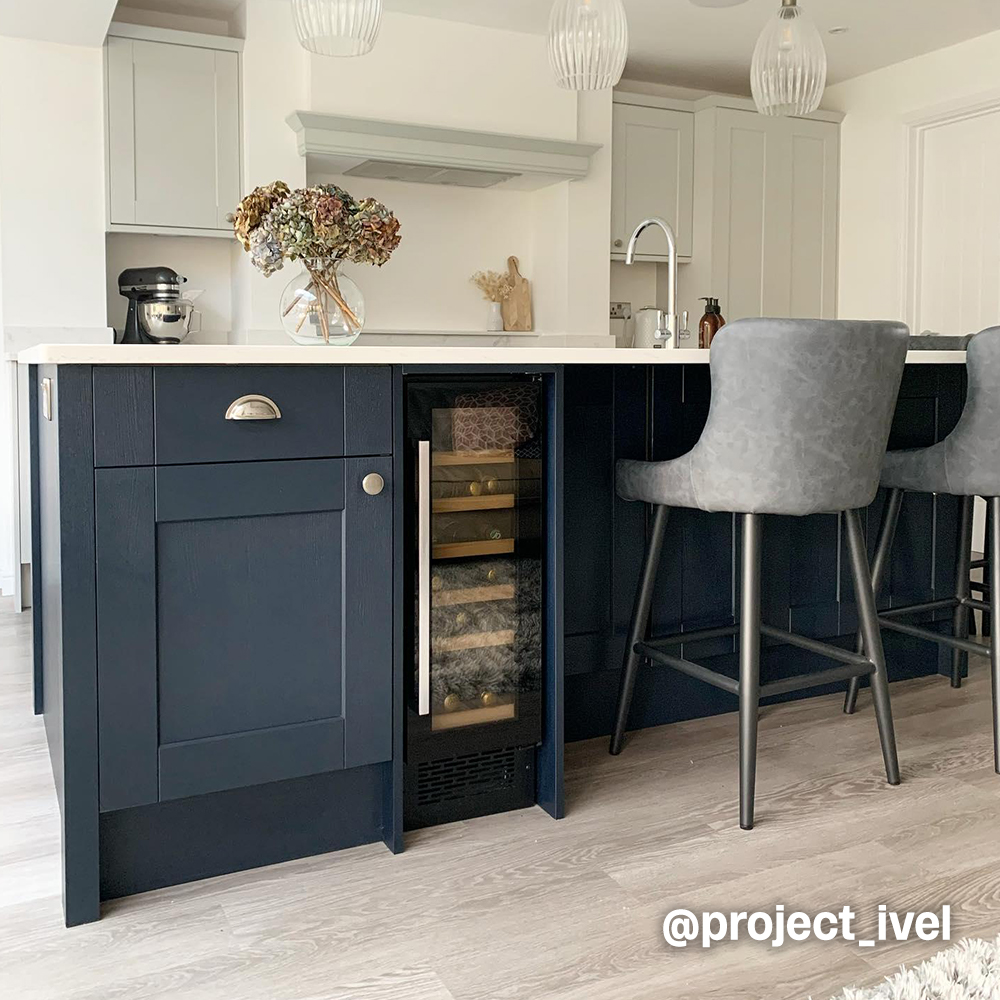 Wine cooler on blue kitchen island