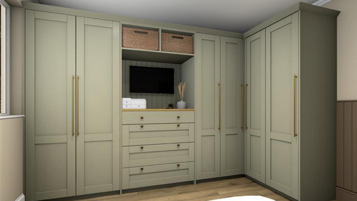 A corner wardrobe unit in a sage green colour. It has shelves, drawers, and inside door storage accessories.
