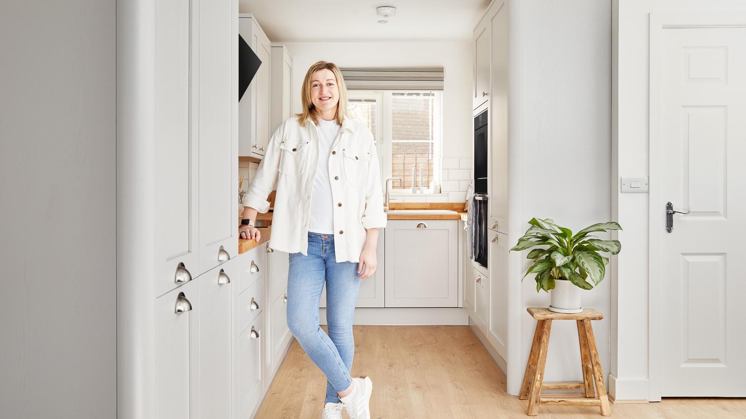 Ellen White stood smiling in her Howdens kitchen