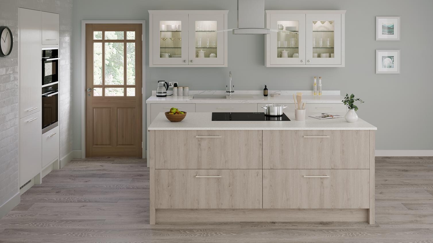A modern oak kitchen idea featuring an oak island and dove-grey units. Includes white worktops and a black induction hob.