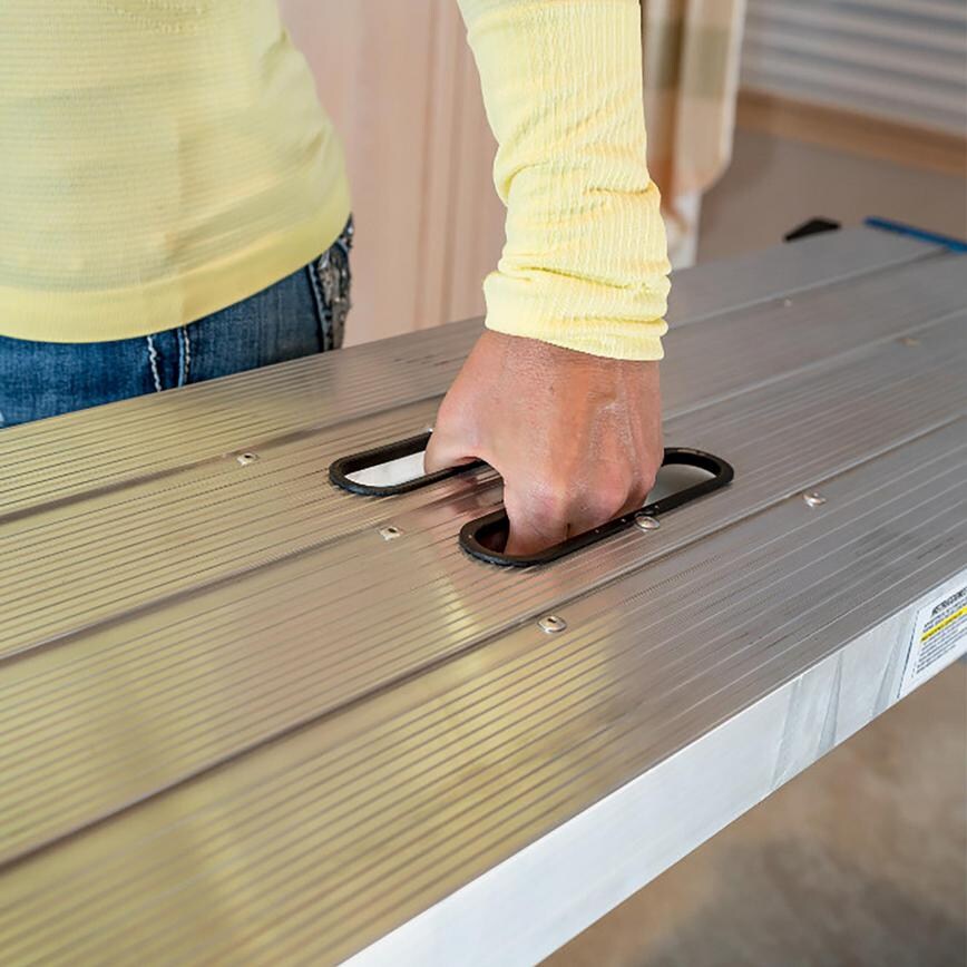 Trend Work Platform Folded Flat Being Carried