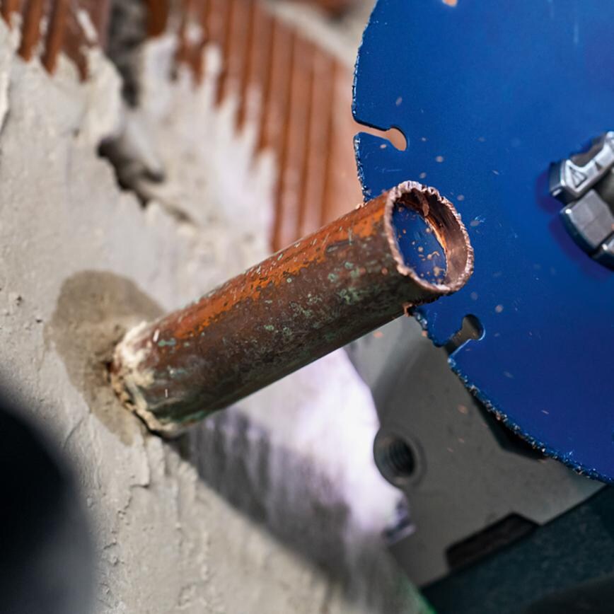 Bosch Xlock Multi Material Cutting Disc in use on pipework