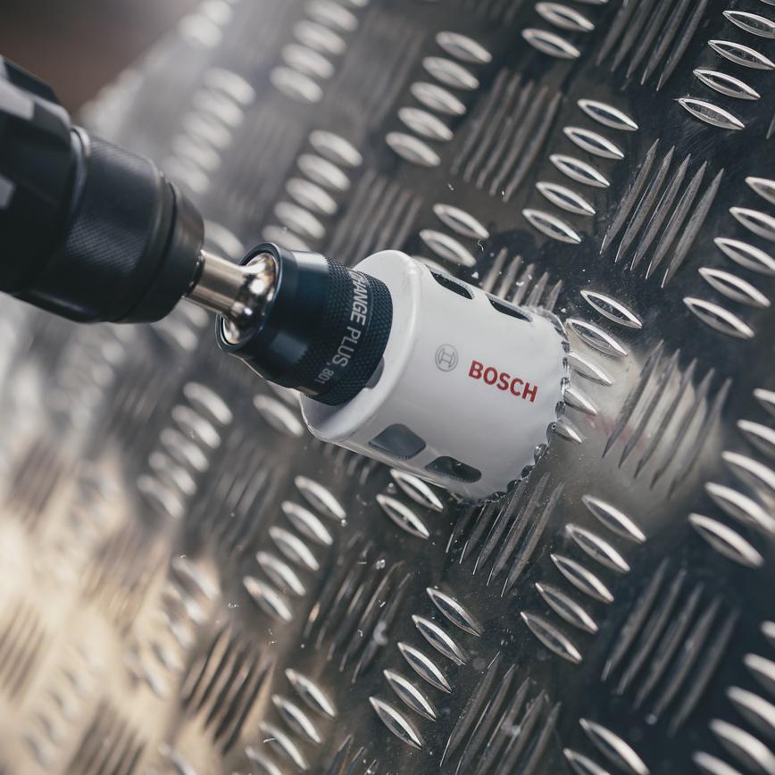 Bosch Holesaw cutting through a metal sheet