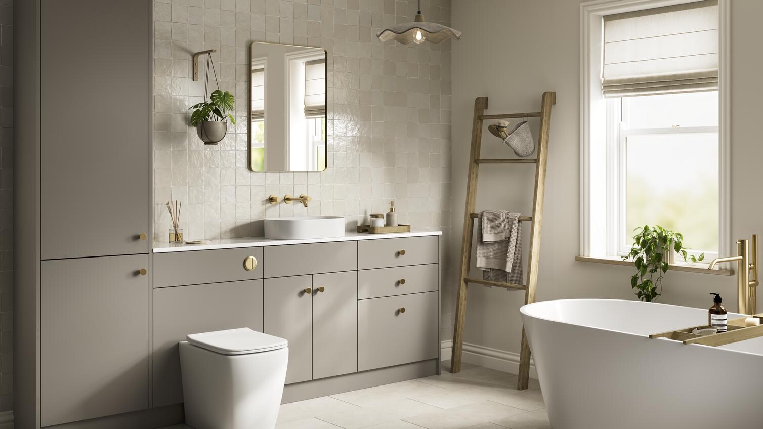 A large, sand grey bathroom with a single wall design. It has golden handles and taps, a white sink, and tile flooring.