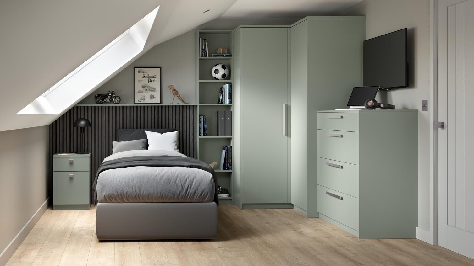 A reed green bedroom with a corner wardrobe and drawers. The room has a matching bedside table and oak-effect flooring.