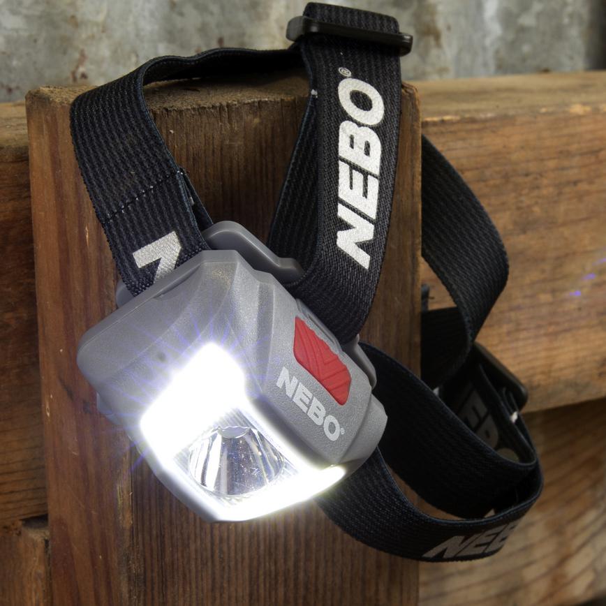Close-up of Nebo Duo Headtorch on wooden beam