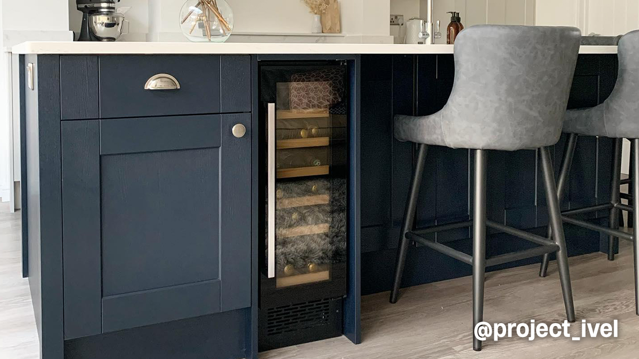 Wine cooler on blue kitchen island